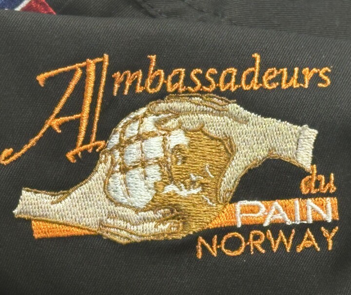 Dette er logoen til Ambassadeurs du pain Norway.